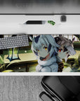 36x16 inches anime girl desk pad in warm greens and soft silver tones, glowing gold-red eyes, dreamy specks.