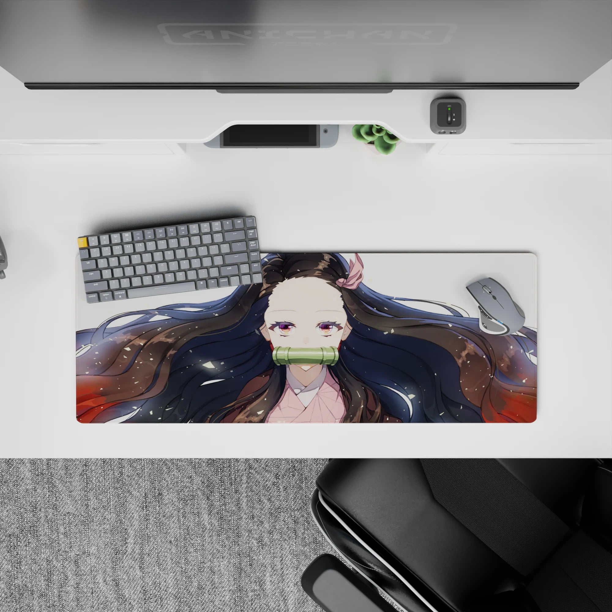 Anime mouse pad 32x12 inches featuring Nezuko with flowing black hair and subtle red highlights on a white background.