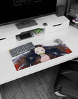 Nezuko anime mouse pad 28x12 inches featuring her serene gaze, flowing black hair with red tips, and gold flecks on white.