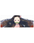 Anime mouse pad featuring Nezuko from Demon Slayer, 32x12 inches, with her serene gaze and flowing black hair with red tips.