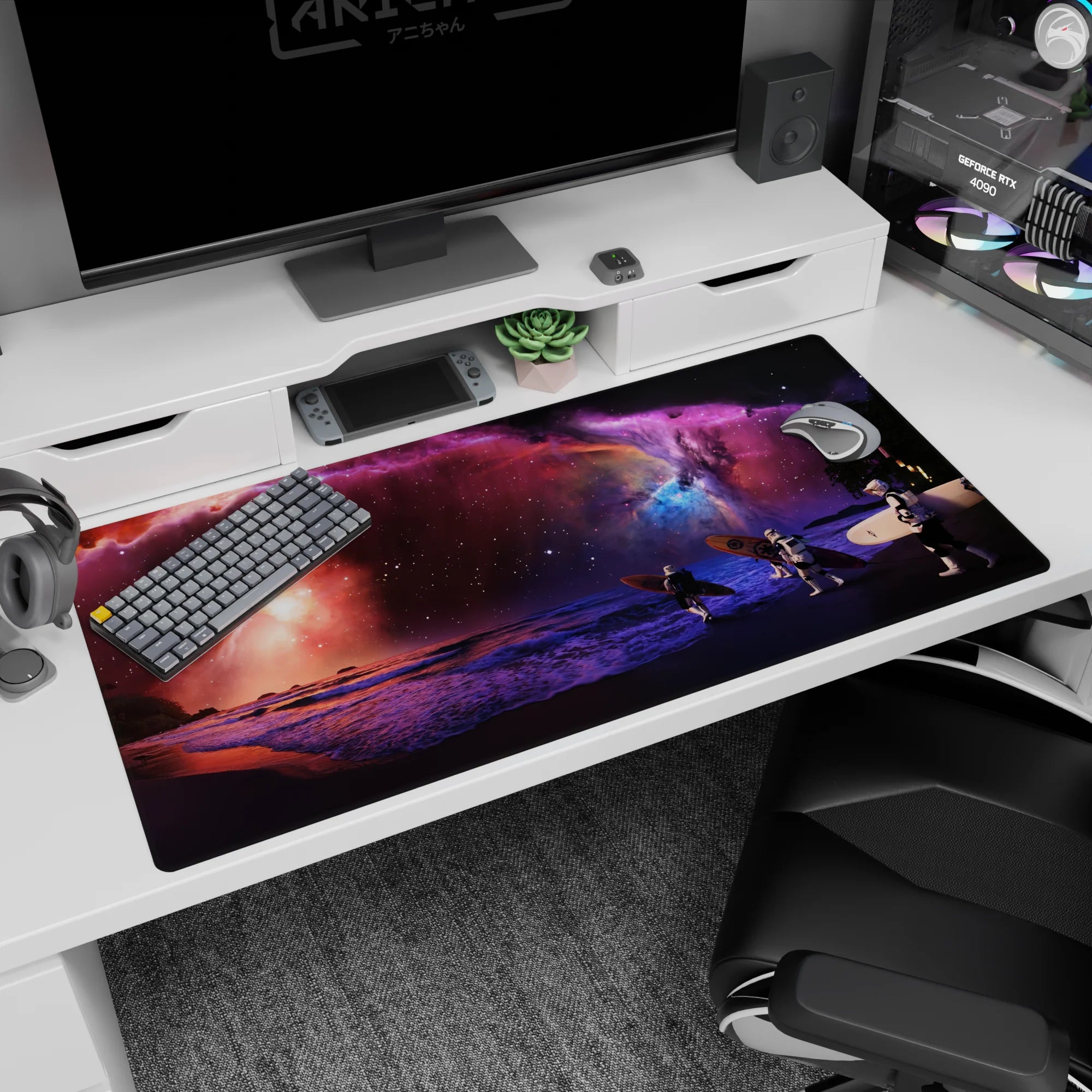 Cosmic beach night desk pad 40x20 inches with purple nebula sky, blue sparks, and soft pink horizon glow.