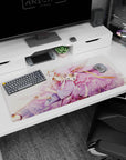 Anime girl in lavender robes with pink wings and a sleepy cat companion desk pad 36x16 inches.