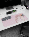 32x16 inches anime mouse pad showing girl with ribbon hugging boy from behind, eyes closed laughing.