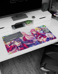 Anime girl mouse pad 32x16 inches featuring two schoolgirls in cherry red blazers under floating leaves.