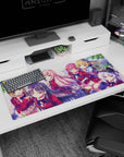 36x16 inches anime girl mouse pad with cute schoolgirls in red blazers, framed by breezy spring leaves.
