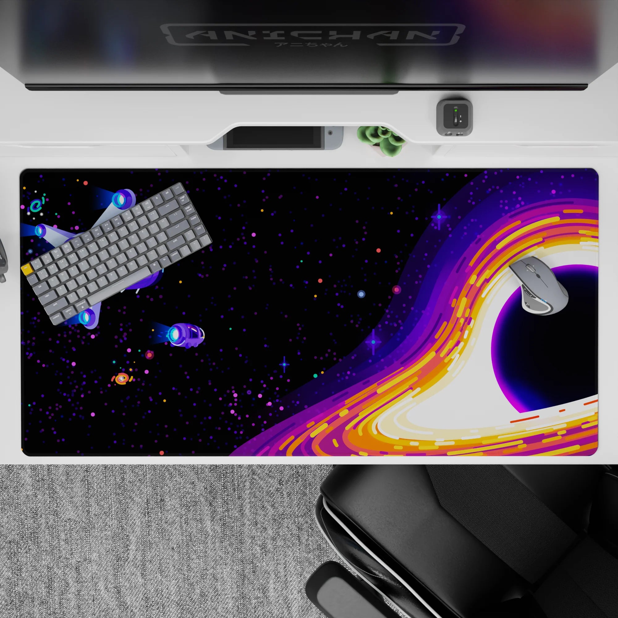 Moody 40x20 inches desk pad in inky black with violet, neon orange pops, and creamy light trails.