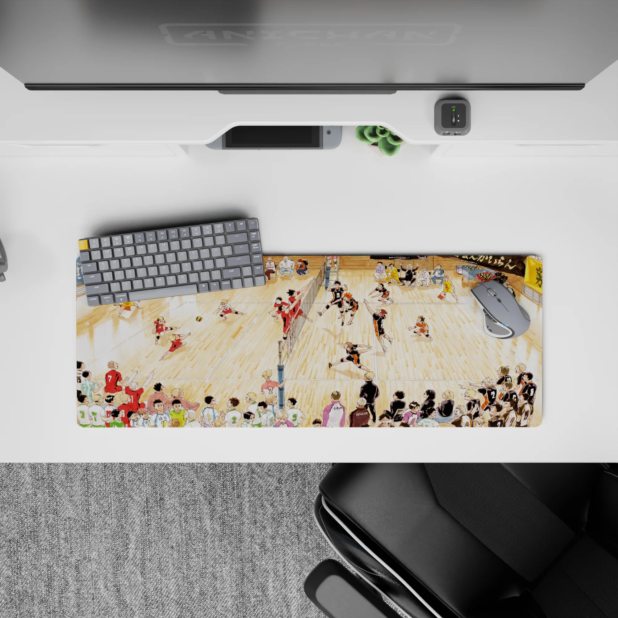 32x12 inches anime mouse pad in warm gym lighting, black-orange vs red jerseys, loud tournament vibe.