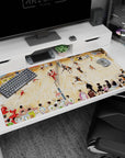 40x20 inches anime desk pad showing black-and-orange spiker mid-jump over net as red team scrambles, 20–21.