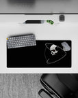 Cosmic spooky vibe in black and white with a sharp red eye accent mouse pad, 28x12 inches.