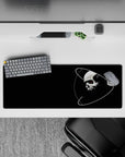 Midnight black and crisp white spooky-cosmic mood mouse pad, 32x12 inches, with a striking red eye accent.