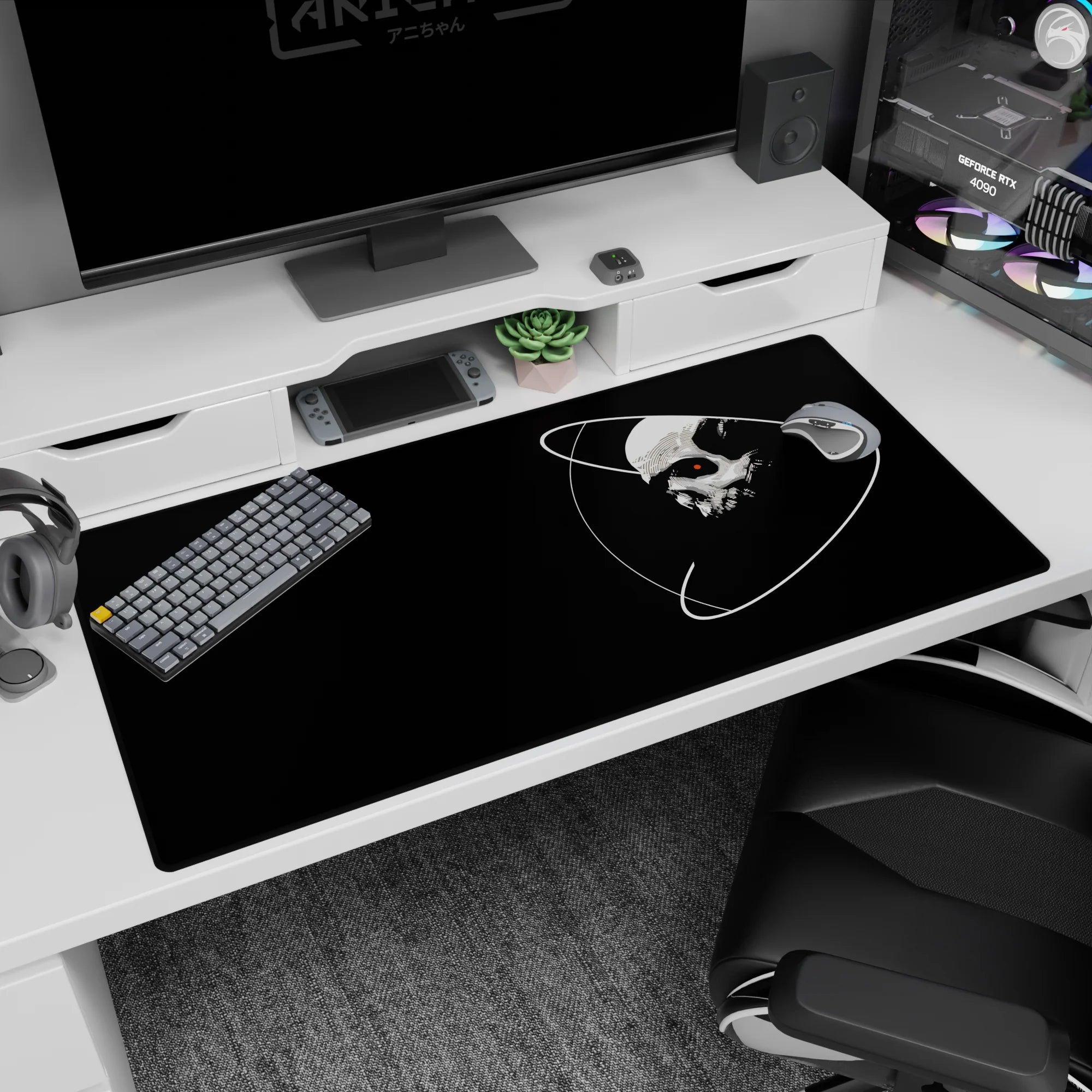 Floating skull scene with white orbital rings and red eye on desk pad, 40x20 inches, high contrast.