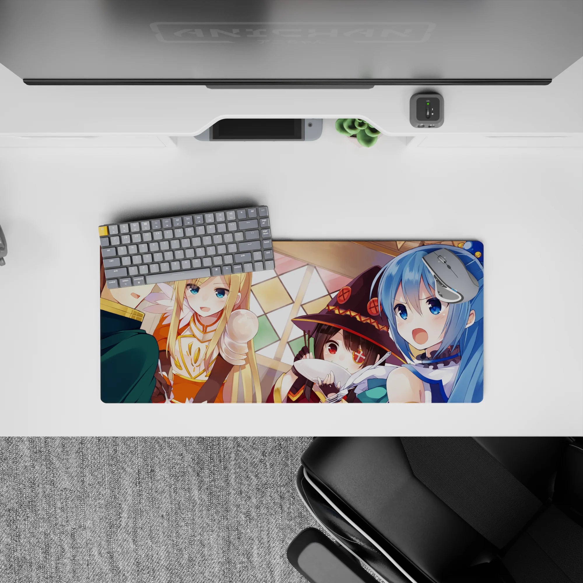KonoSuba anime mouse pad 28x12 inches featuring Kazuma, Aqua, Darkness, and Megumin in a lively tavern scene.