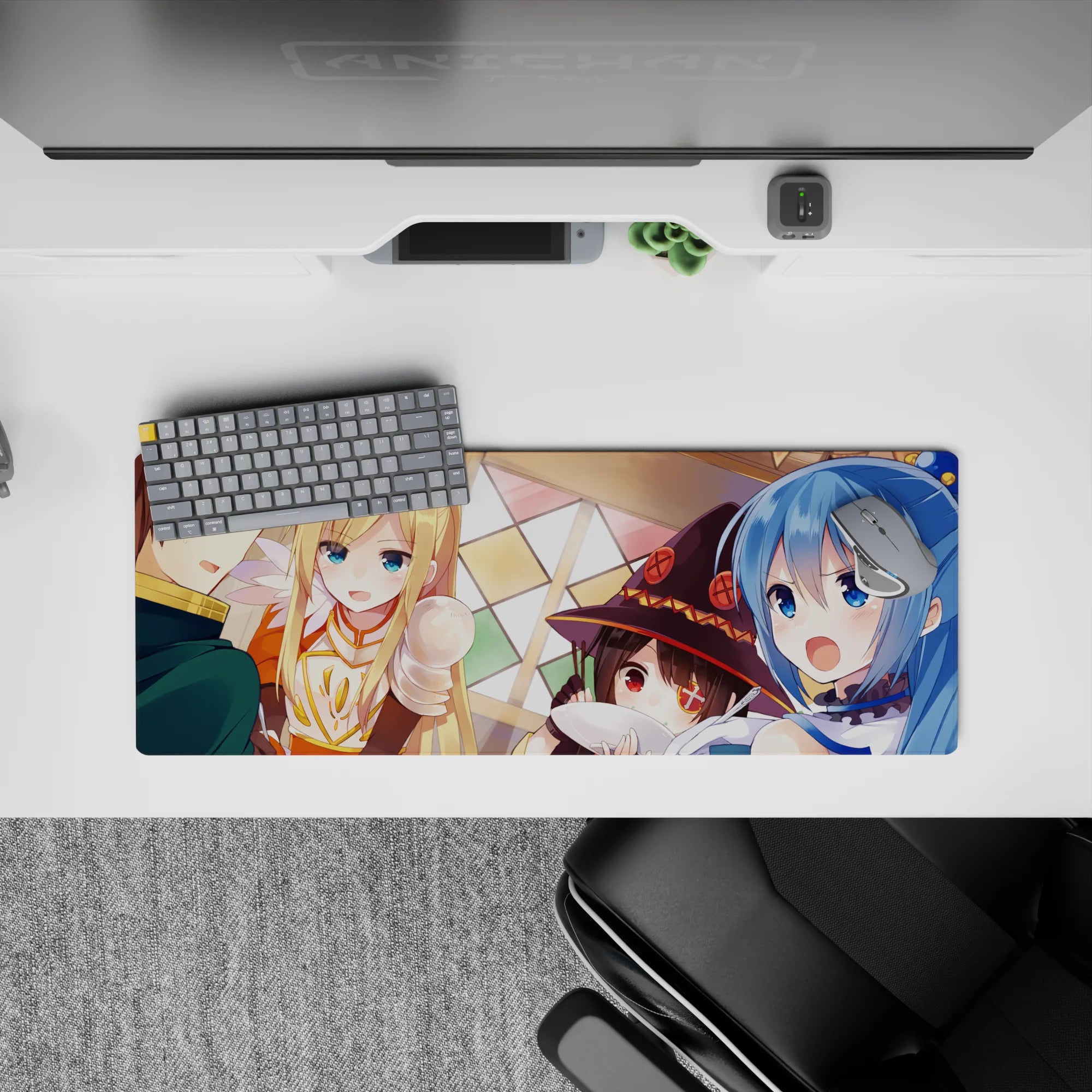 KonoSuba anime mouse pad 32x12 inches featuring Kazuma, Aqua, Darkness, and Megumin in a tavern scene with warm lighting.