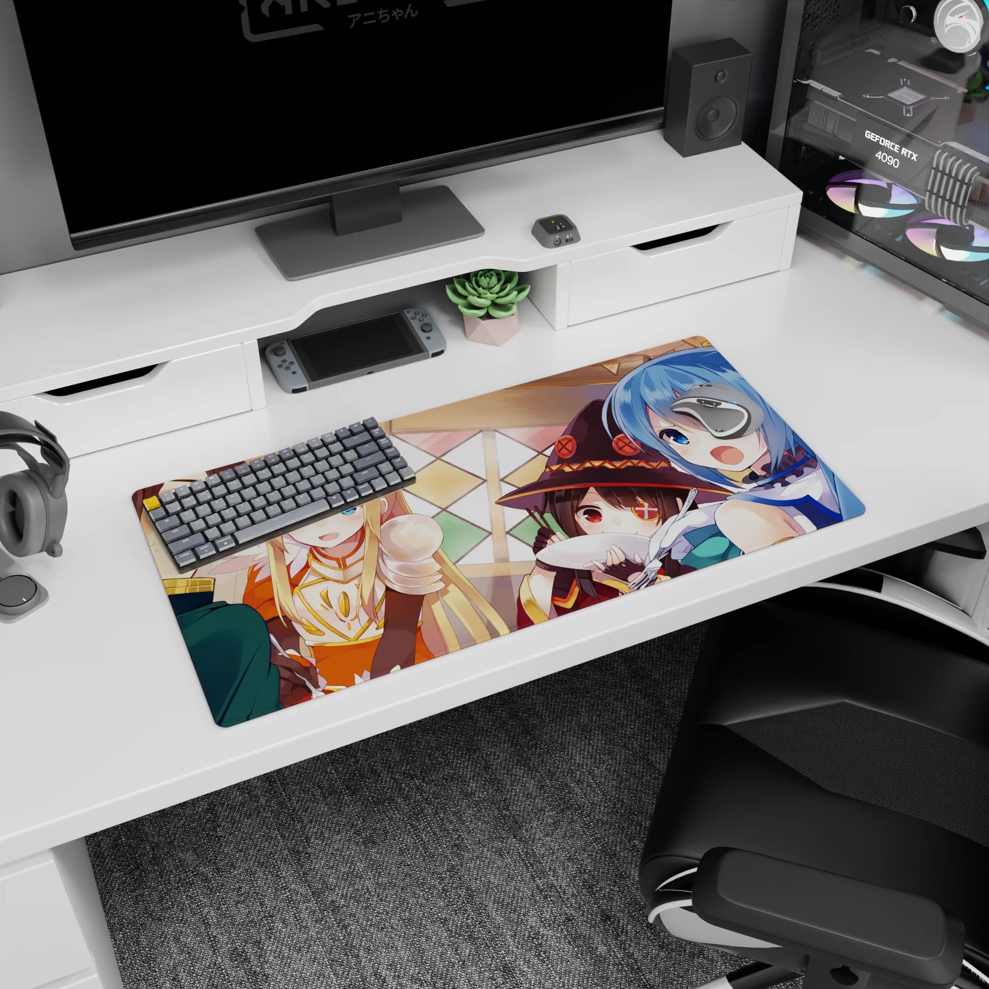 KonoSuba anime mouse pad 32x16 inches featuring Kazuma, Aqua, Darkness, and Megumin in a chaotic tavern scene.