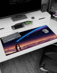 36x16 inches anime desk pad showing two students leaning close as a blue-violet comet streaks overhead.