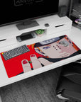 Pain (Nagato) Rinnegan close-up on anime desk pad 36x16 inches, piercing details over bold red background.