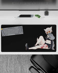 32x16 inches anime desk mat in deep charcoal tones, amber shades, crisp white stripes, playful mischievous vibe.