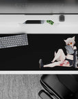 Charcoal and black anime desk pad 36x16 inches with white stripes, amber shades, playful mood.
