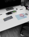 Faceless pink-haired anime girl in big navy headphones on blue backdrop mouse pad 14x10 inches.