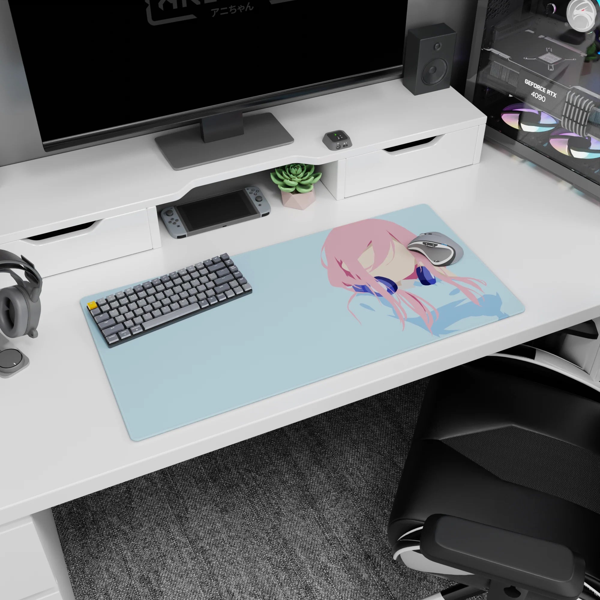 Faceless pink-haired anime girl wearing deep navy headphones on blue background mouse pad 32x16 inches.