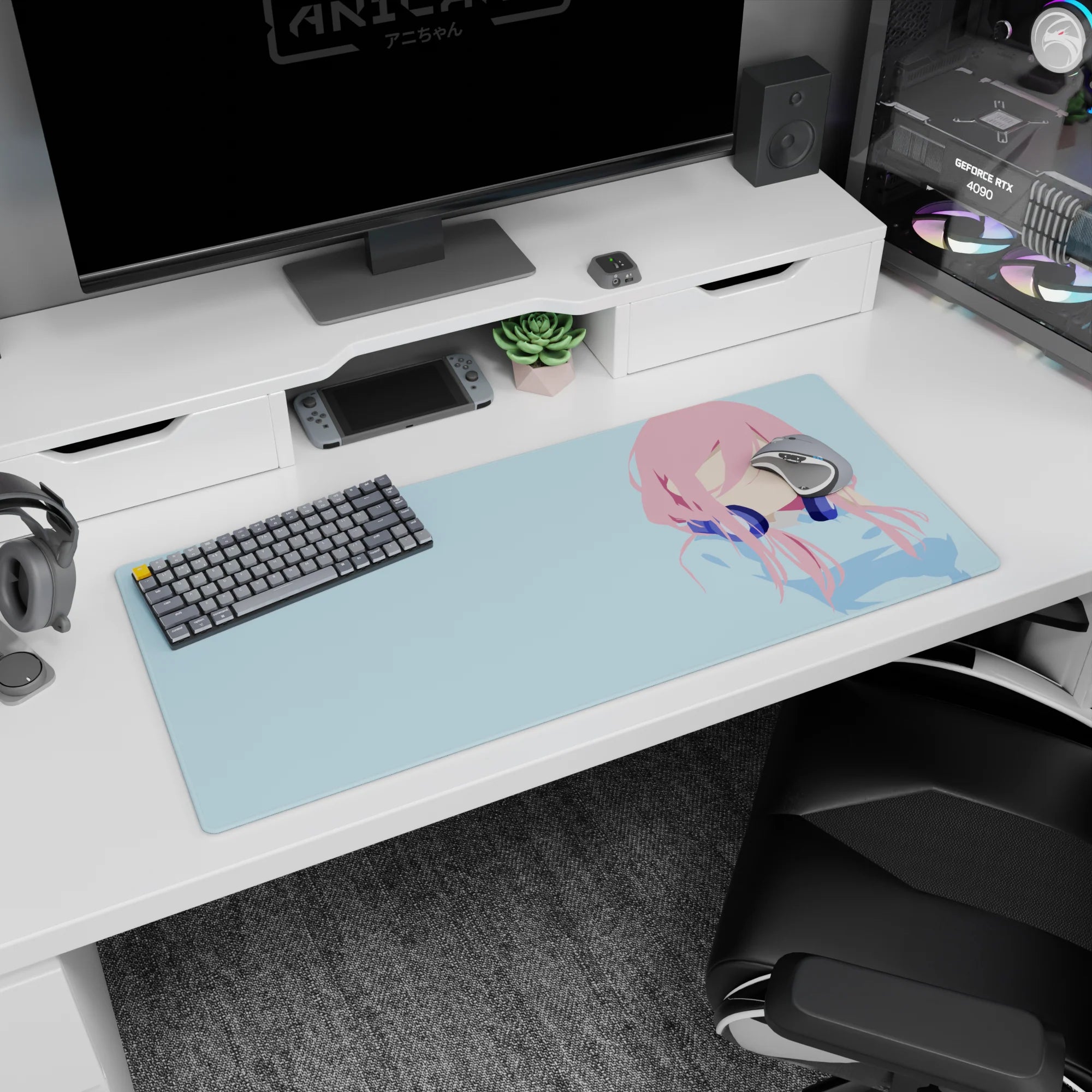 36x16 inches anime girl desk pad showing a pink-haired figure in deep navy headphones, centered on blue.