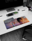 28x12 inches mouse pad featuring teal-eyed anime girl looking back, long dark hair in breeze, white strappy top.