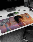 Teal-eyed anime girl looking back on a rooftop desk pad 40x20 inches, dark hair in breeze, white top.