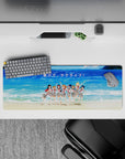 Ocean-blue beach scene anime girl mouse pad 32x12 inches, red ribbon accents, bright nostalgic vibe.