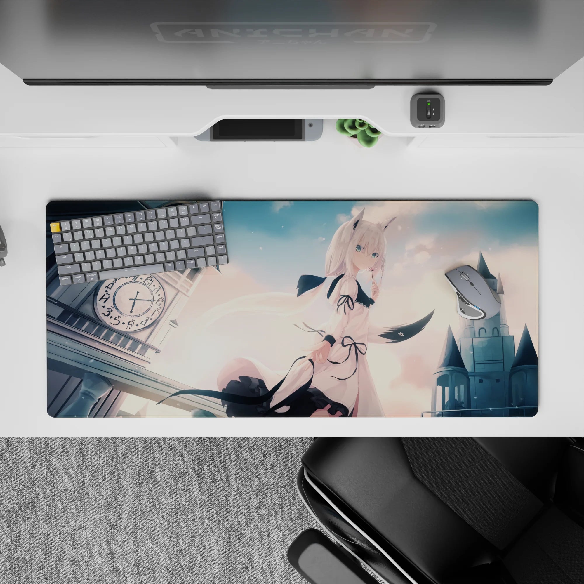 Pastel peach clouds and cool gray gothic skyline on an anime desk pad 36x16 inches, dreamy calm vibe.