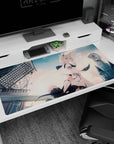 Ivory-haired cat-eared anime girl with pale blue eyes on desk pad 40x20 inches, shy glance in clouds.