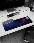 Sleepy galaxy scene mouse pad 32x12 inches with wispy clouds and a hidden pink nebula corner.
