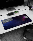Sleepy galaxy scene mouse pad 32x16 inches featuring stormy space clouds and a hidden pink nebula.