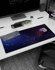 Sleepy galaxy scene desk pad 36x16 inches featuring a pink nebula tucked into deep space clouds.