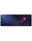 Galaxy swirl desk mouse pad 32x12 inches with hand-painted stormy clouds and nebula glow.