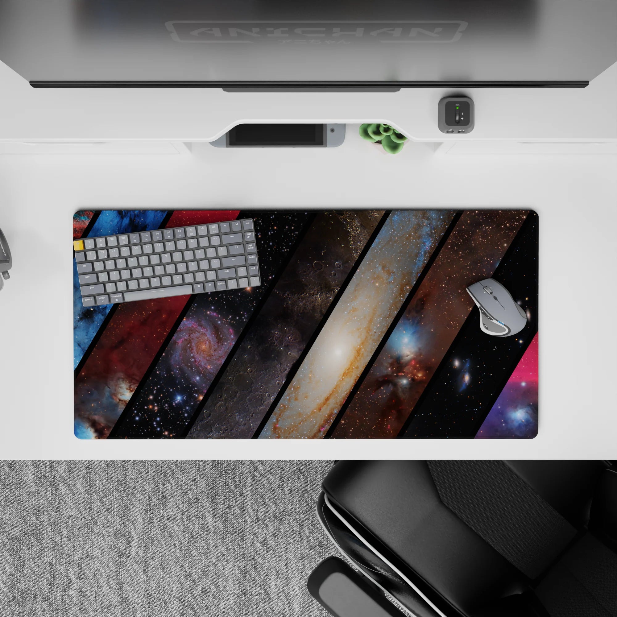 Cozy cosmic desk mouse pad in deep navy, smoky red, and dusty brown tones, 32x16 inches.
