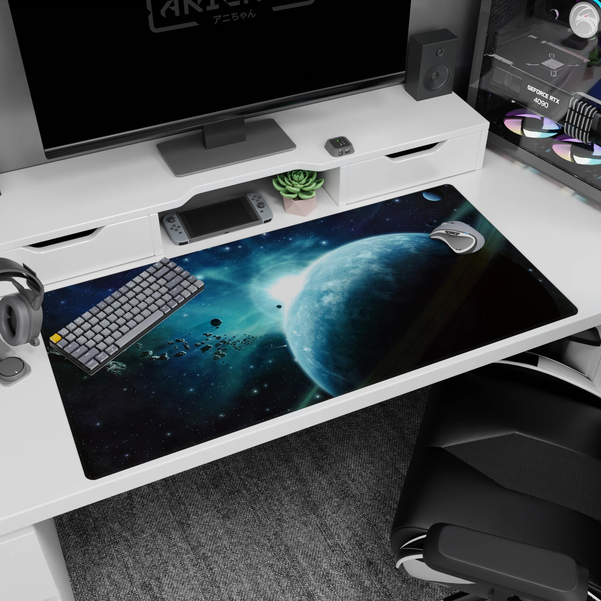Ringed planet scene desk pad 40x20 inches with shadowy silhouette, stars, and rocky asteroids.
