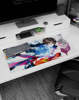 Anime girl mouse pad 32x16 inches showing boy catching pink-haired girl as blue ribbons spiral around them.
