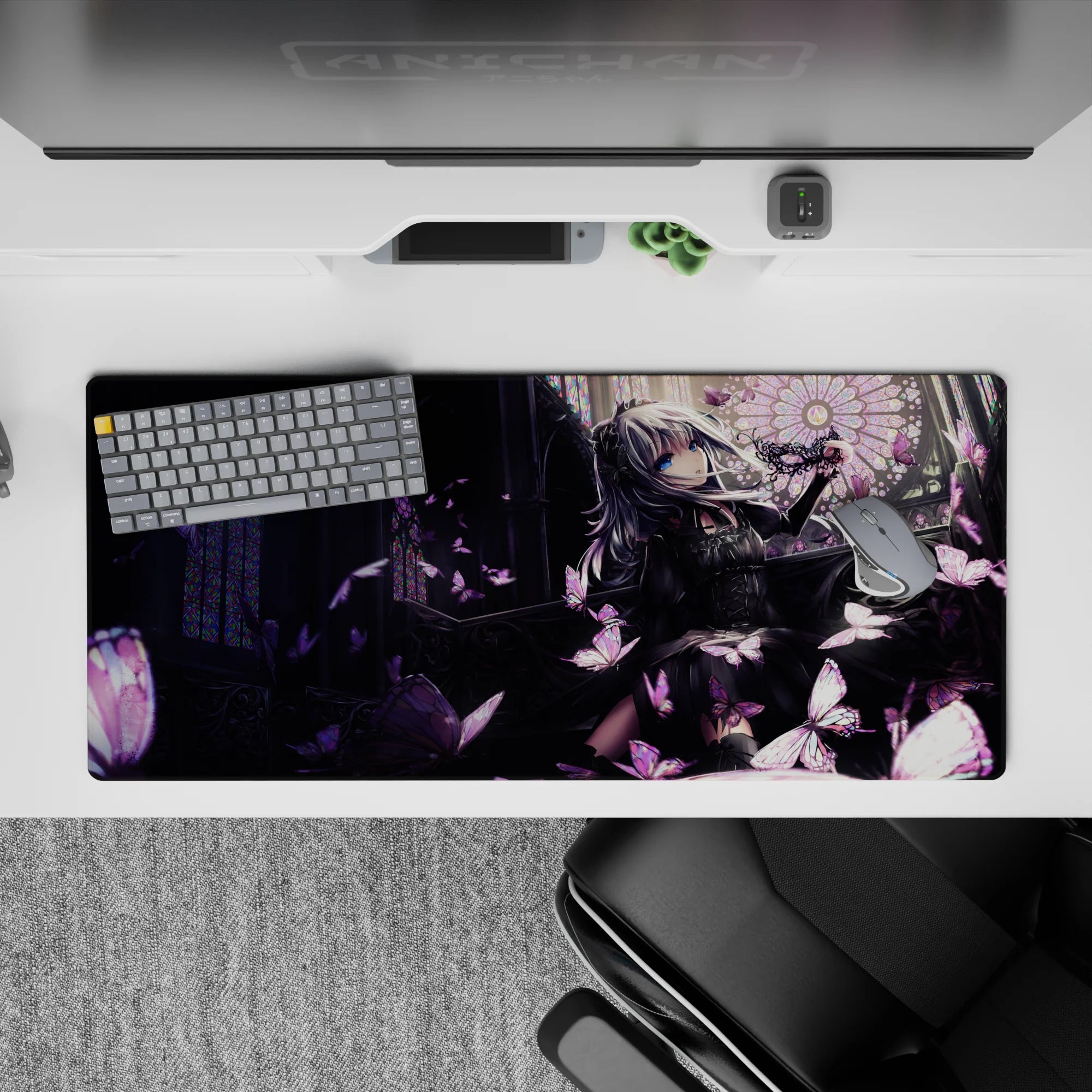 Moody purple-and-charcoal anime desk pad 36x16 inches with rose highlights for a cozy gothic gaming setup.