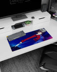 28x12 inches extended mouse pad showing icy-stared swordswoman twisting mid-strike, jacket snapping behind.