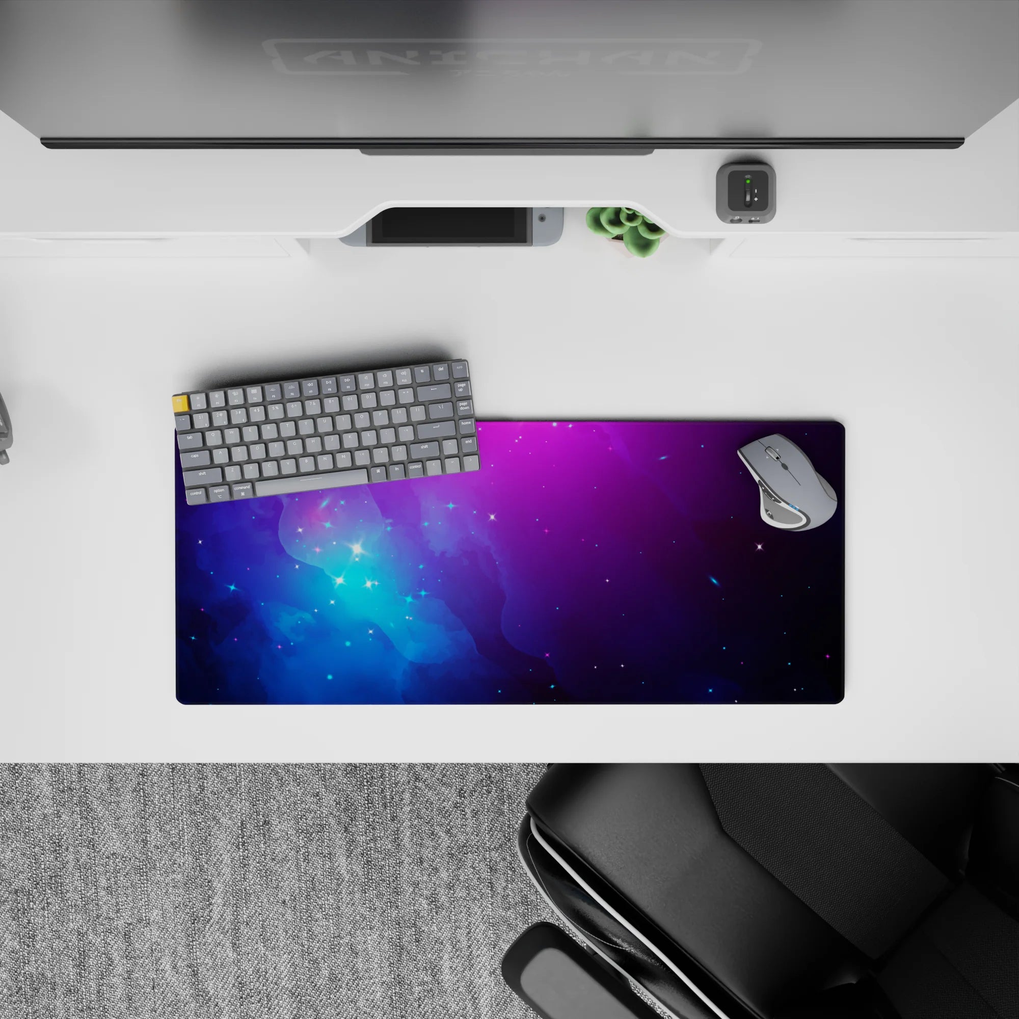 Dreamy violet-to-electric blue mouse pad 28x12 inches with calm night-sky mood and soft glow.