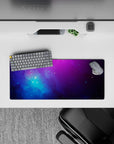 Dreamy violet-to-electric blue mouse pad 28x12 inches with calm night-sky mood and soft glow.