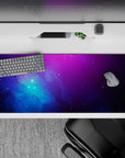 Deep violet to electric blue 36x16 inches desk pad, calm cosmic mood with subtle twinkling stars.