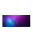 Galaxy vibes desk mouse pad 28x12 inches with cloud-like swirls and twinkling star specks.