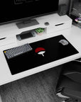 Sasuke Uchiha inspired fan emblem floating on black anime desk mat mouse pad 32x16 inches.