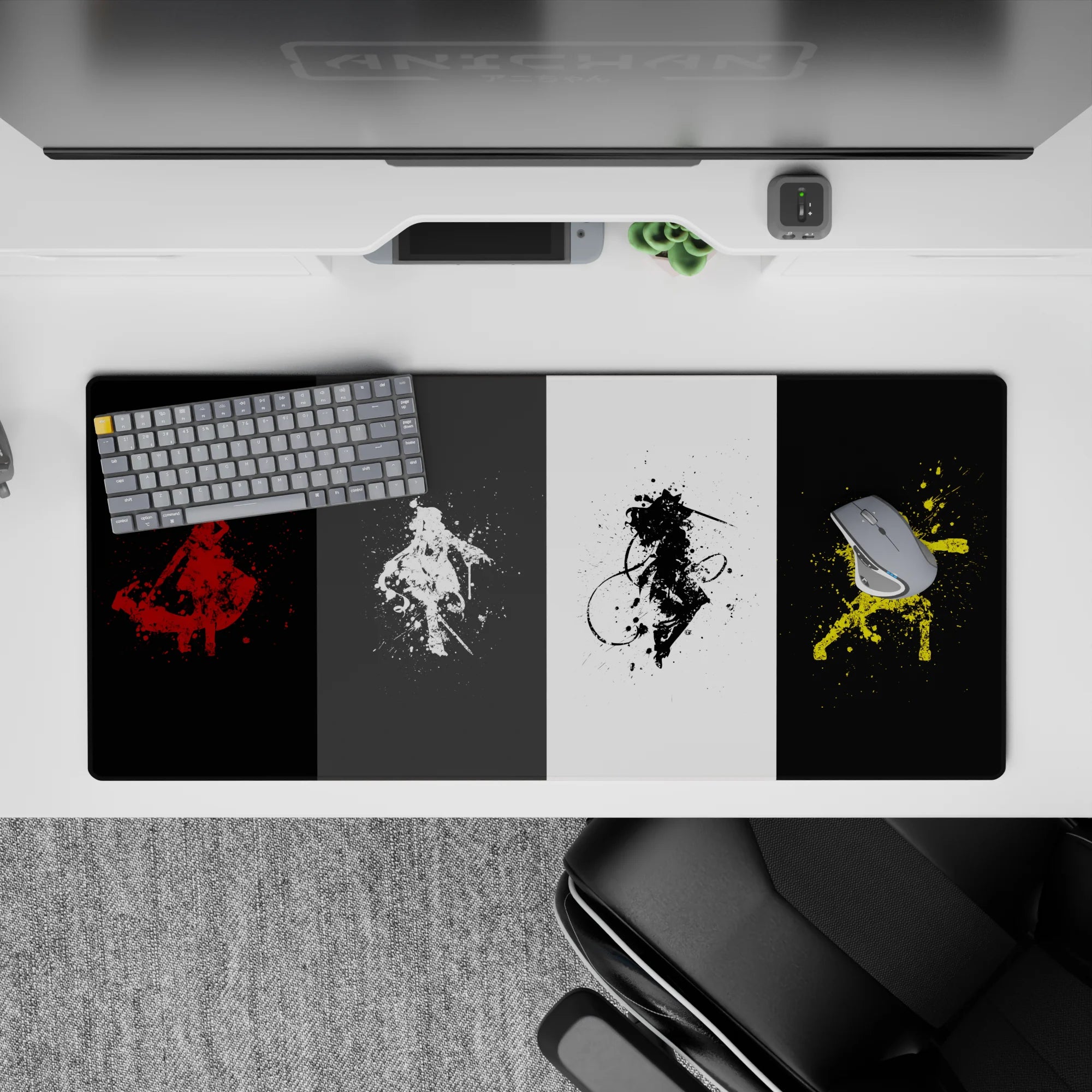 36x16 inches anime desk pad in red, white, black, and electric yellow with gritty paint splatter mood.
