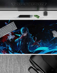 Anime desk pad 40x20 inches featuring Joker and Arsène from Persona 5, deep blues and fiery red accents creating chaos.