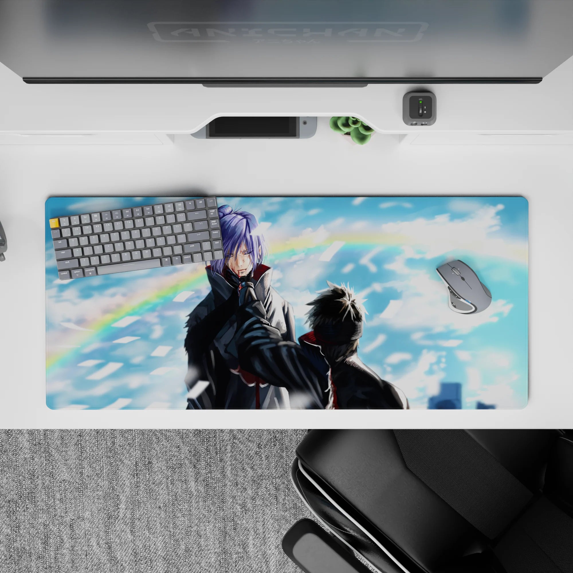 36x16 inches blue-and-white anime desk pad, sharp highlights and snowlike paper shards for dramatic mood.