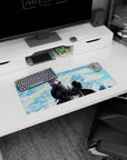 Konan facing Pain scene anime mouse pad 28x12 inches, swirling paper shards in a stormy sky.