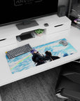 Konan facing Pain anime mouse pad 32x12 inches, dramatic sky scene with drifting paper shards like snow.