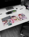 32x16 inches anime girl mouse pad featuring a glasses-wearing lead girl with glossy hair, blush cheeks, and friends.